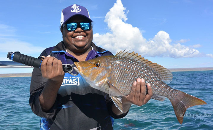 abrolhos islands fishing: lady angler with a spangled emperor she caught near the abrolhos islands.