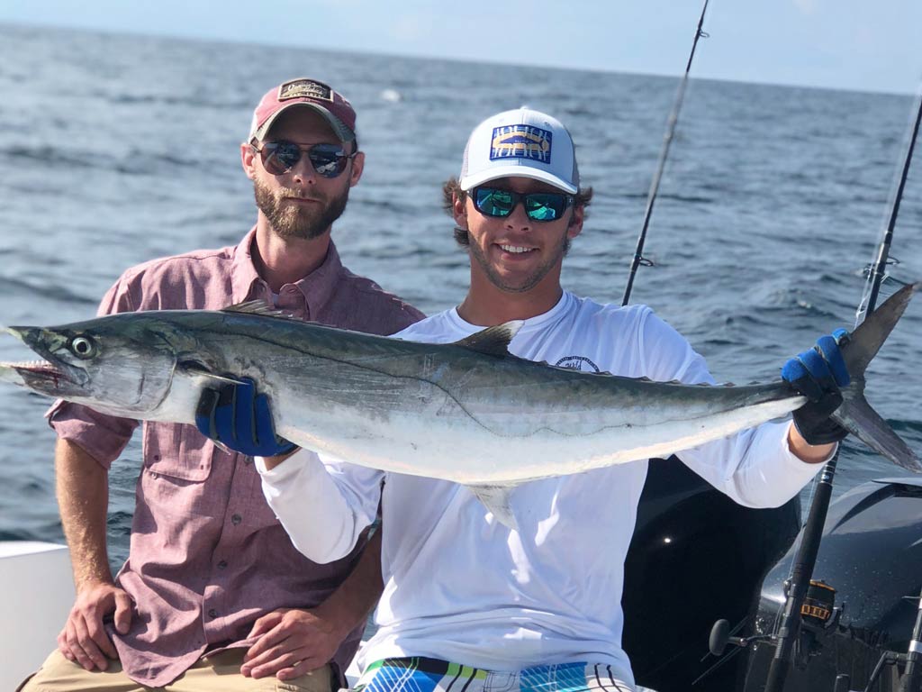 Two anglers posing with a big King Mackerel