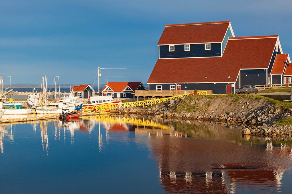 A view across the watert towards fishing docks in Bonavista, Newfoundland on a clear day