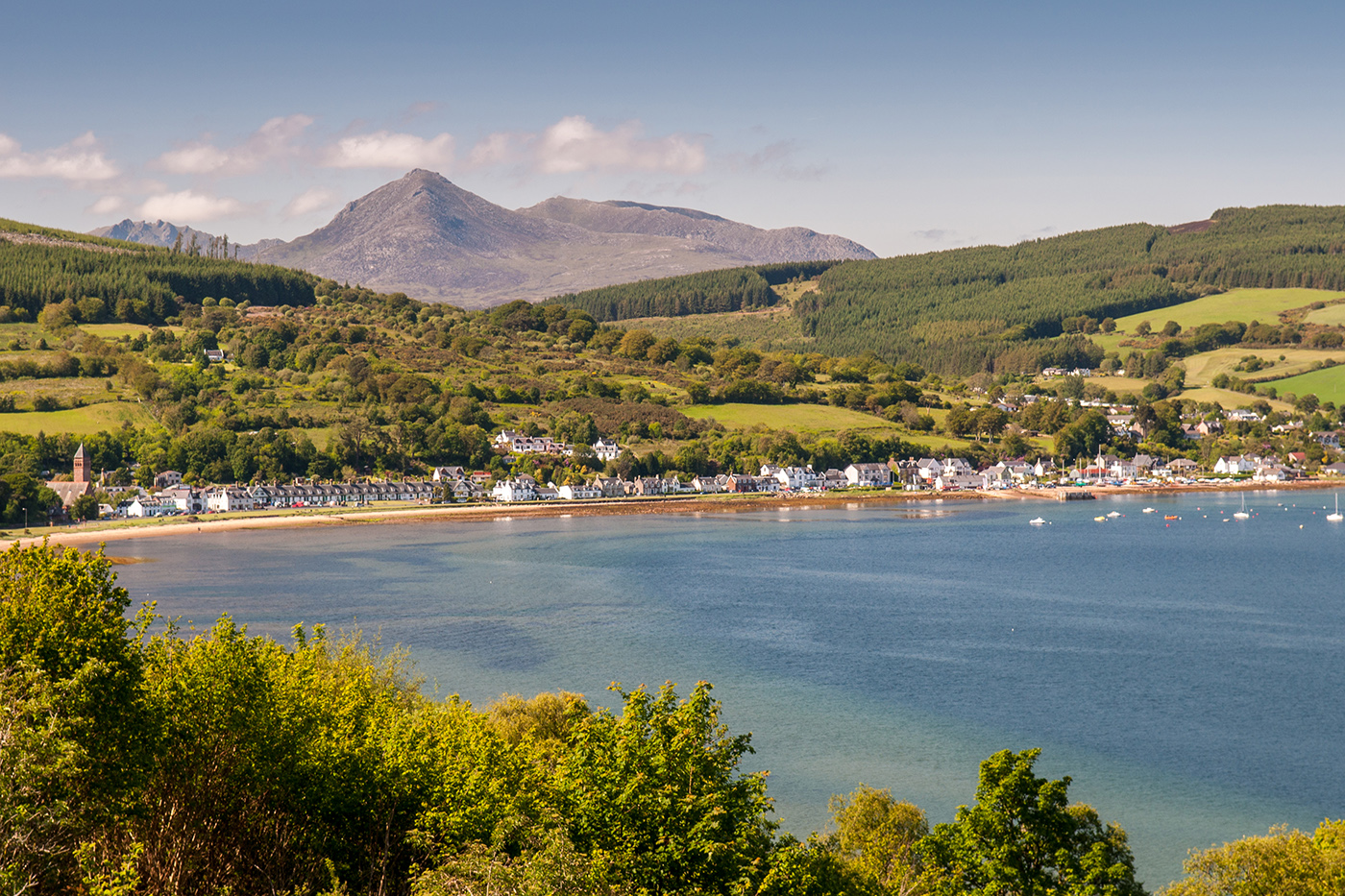 A sheltered bay on the Isle of Arran, with mountains in the distance