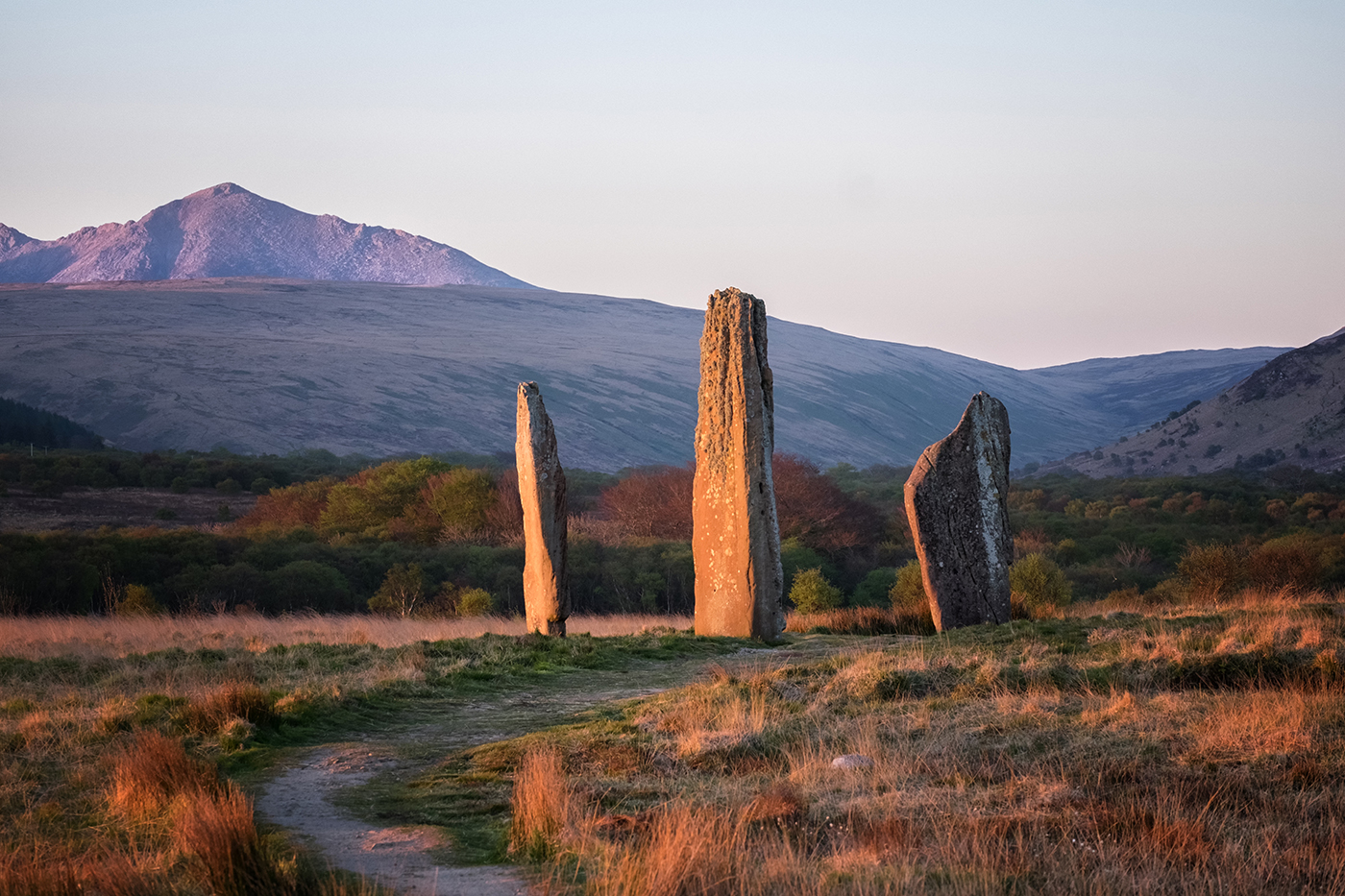 Ancient standing stones on the Isle of Arran, with Goat Fell mountain in the distance