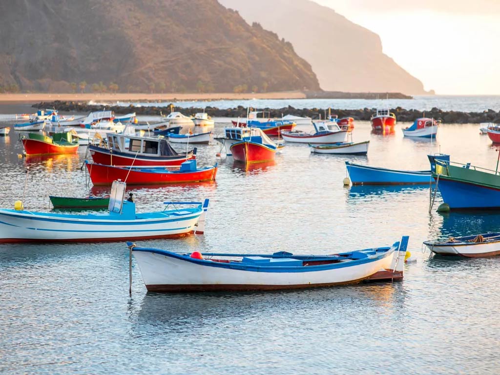 A view of a selection of boats on the water in Terrasitas beach, Spain
