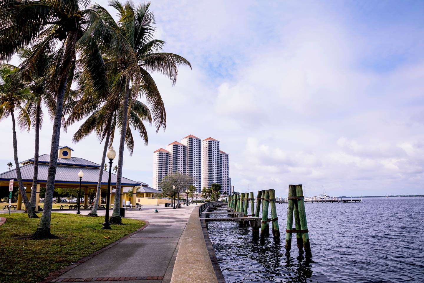 The coastline of Fort Myers with palm trees and buildings
