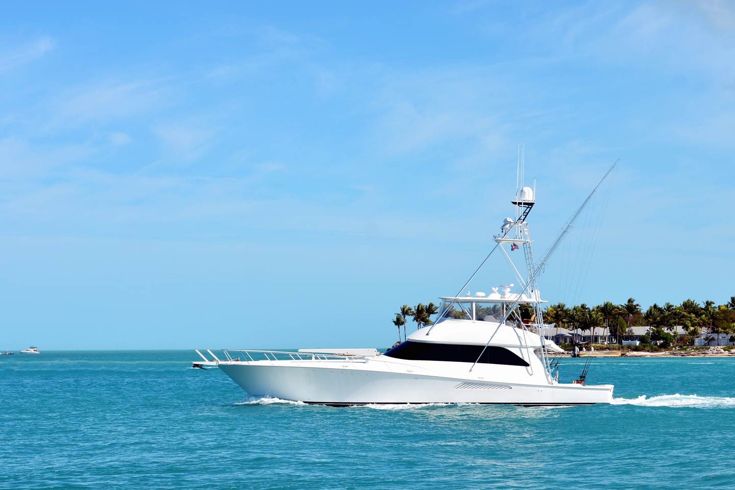 A white sportfishing yacht on its way to the fishing grounds in South Florida