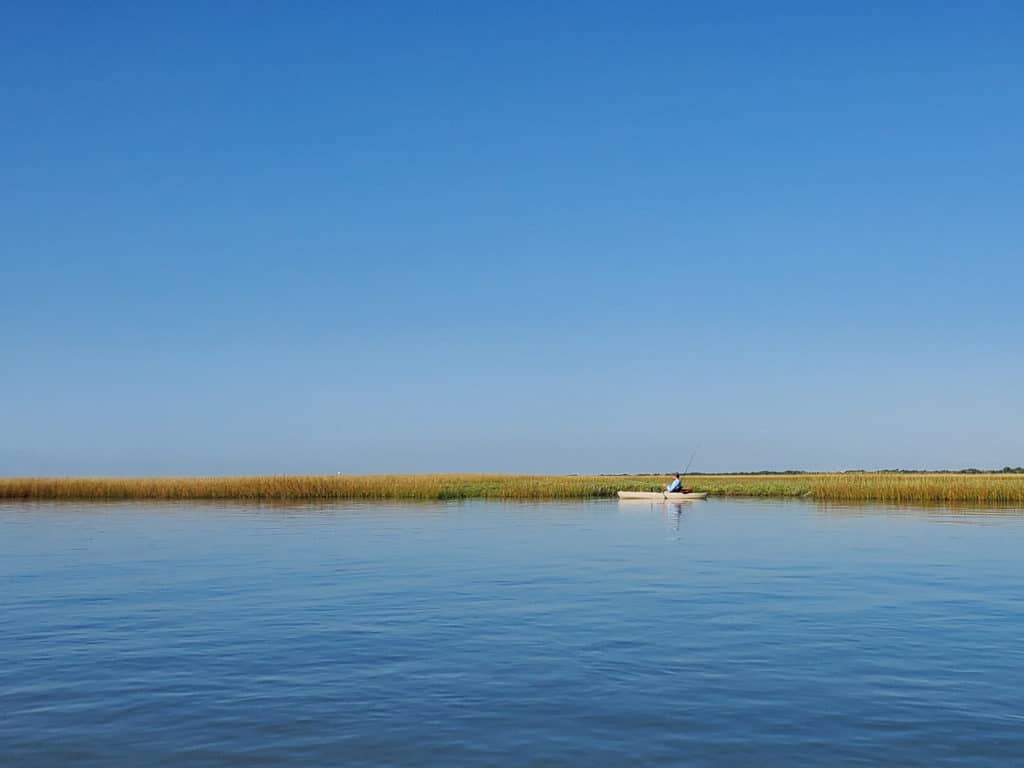 An angler fishing the Texas flats from a kayak