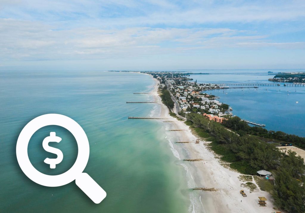 Ocean coast with an icon of a magnifying glass with a dollar sign in it