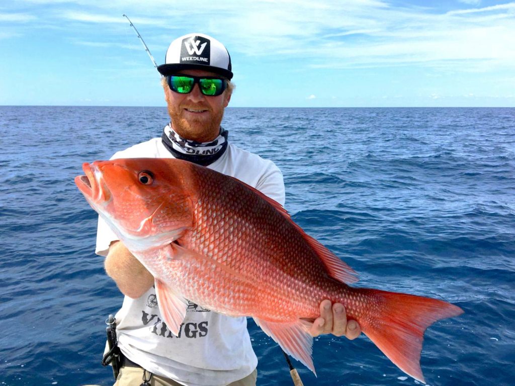 A man holding a Red Snapper 