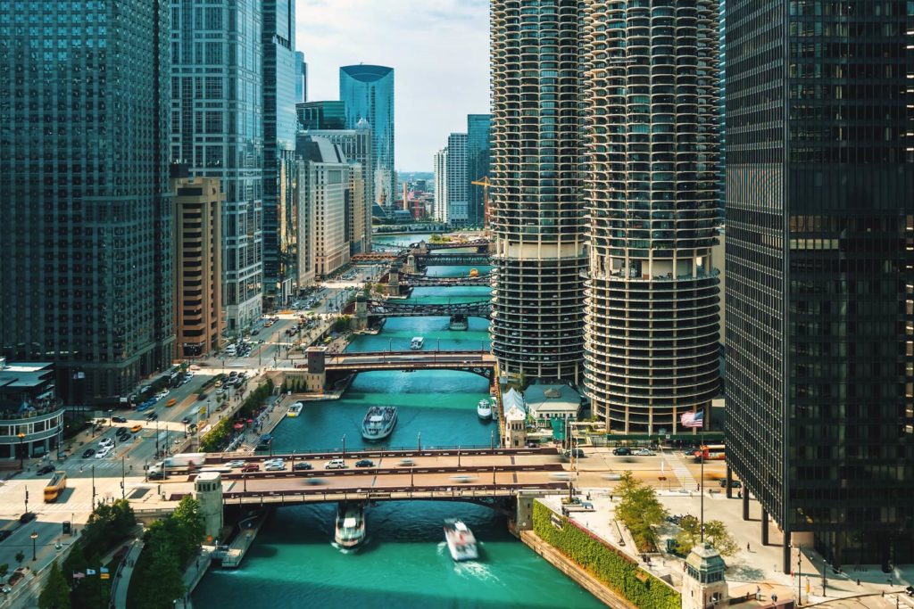 A view of part of Chicago's harbor system with buildings, bridges, walkways, and the Chicago River on view