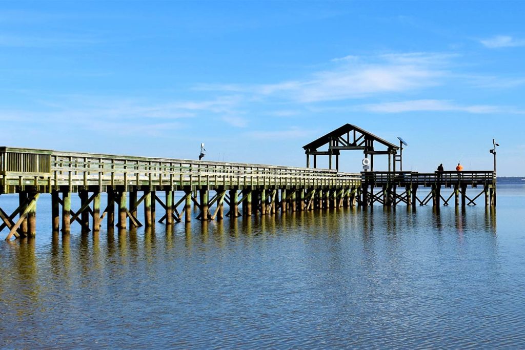 A view of a fishing pier on a river in Virginia