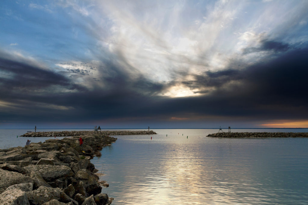 Sunset along Lake Winnebago's rocky shoreline