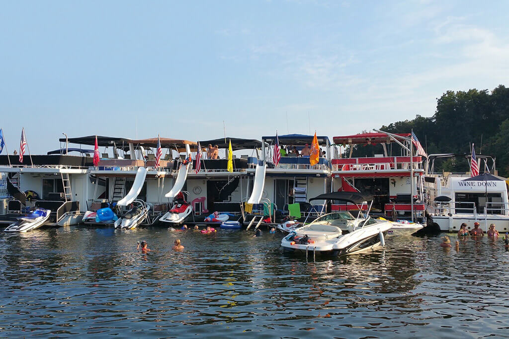 A row of houseboats on Kinkaid Lake, IL, one of the top father's day fishing spots in the US