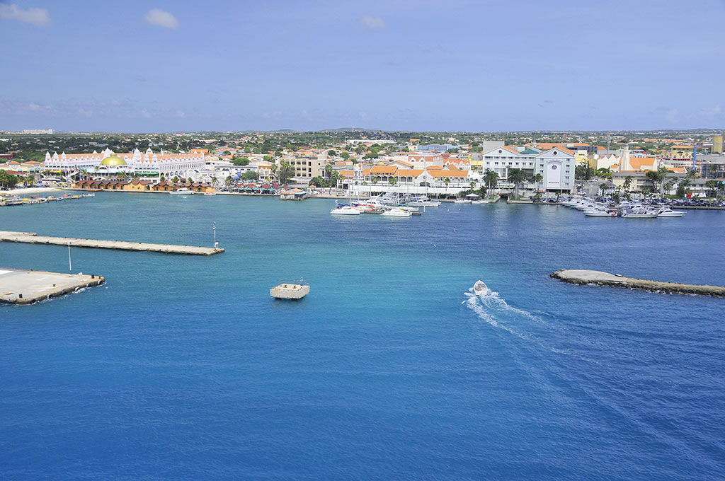 An aerial view of Oranjestad harbor on a sunny day