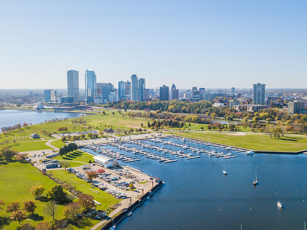 A view of Milwaukee's skyline with a marina in the foreground