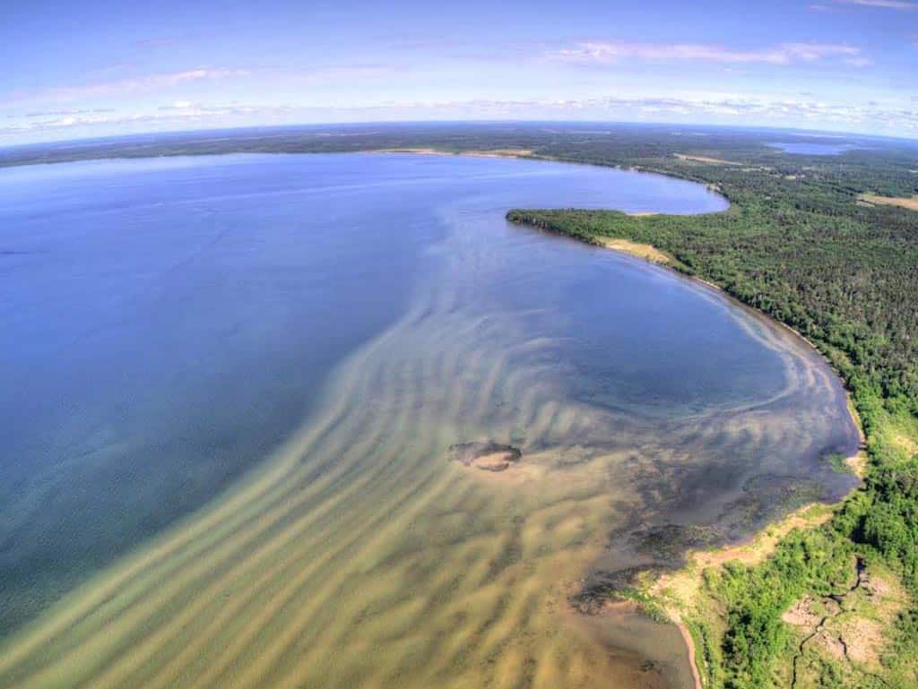 An aerial view of Minnesota's Lake Winnibigoshish and the surrounding forest nature