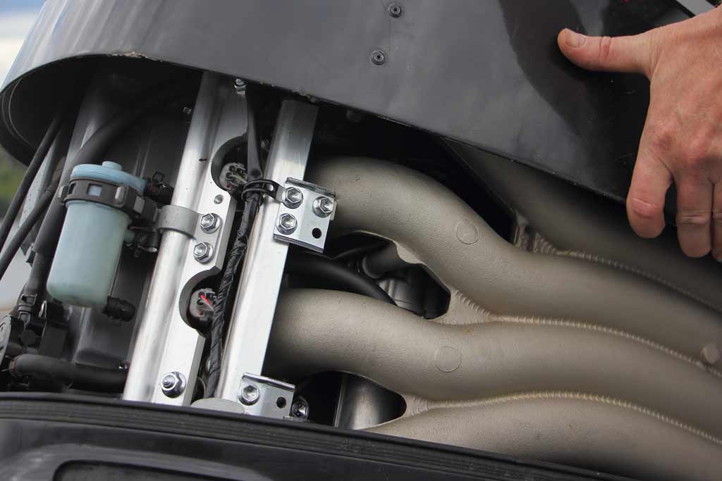 A half-opened hood of an engine boat