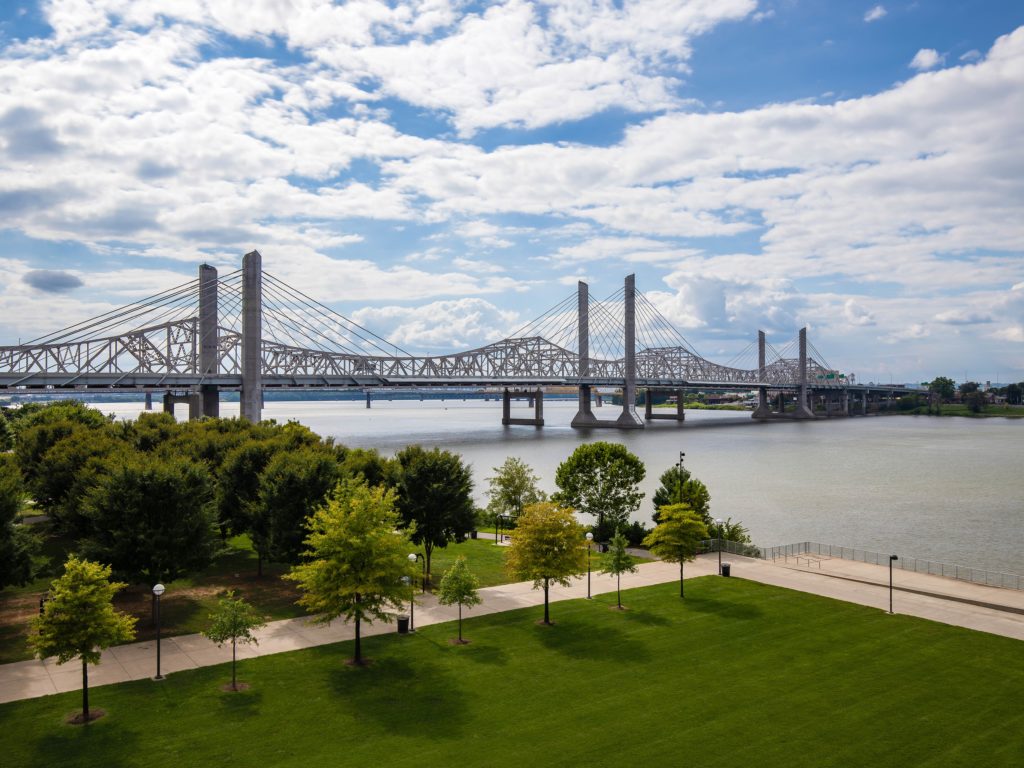 The Abraham Lincoln Bridge for motor vehicles crosses the Ohio River that connects Kentucky and Indiana