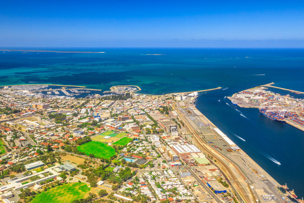 an aerial view of Fremantle, with South Mole and North Mole jetties, with the Indian Ocean in the Background
