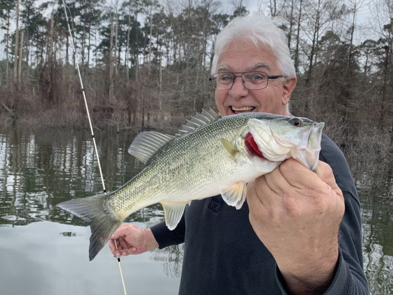 smiling angler on Sam Rayburn