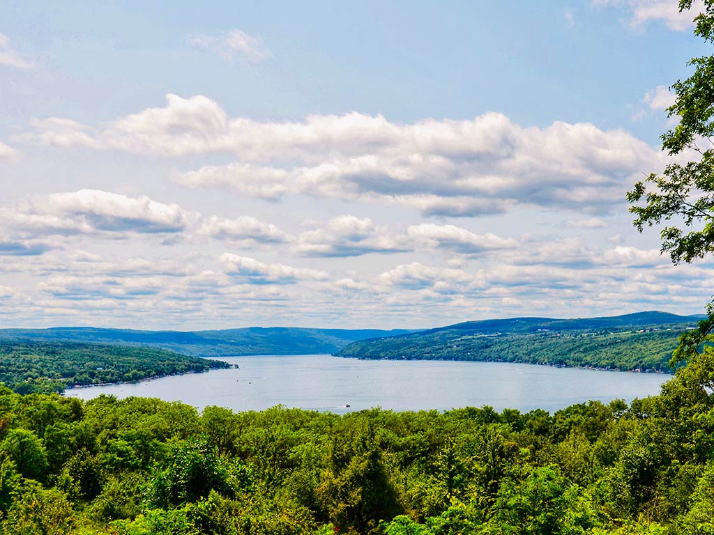 A view from a hill looking towards Keuka Lake in New York on a clear summer's day
