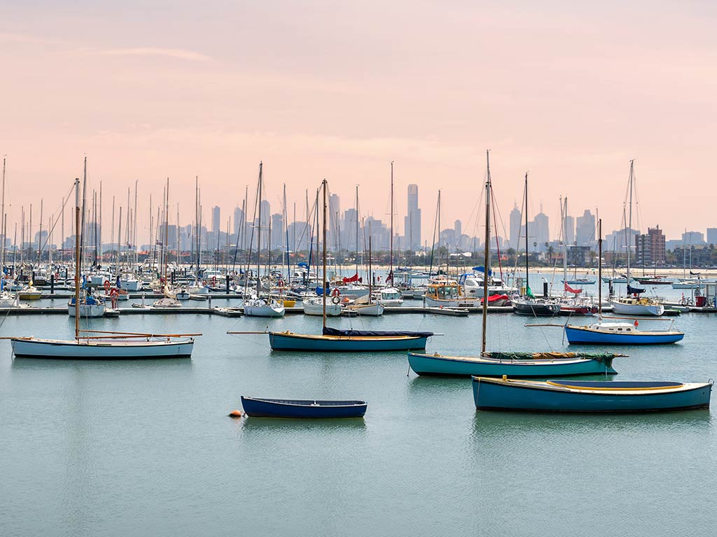 A view from St. Kilda across Port Phillip Bay towards the Melbourne skyline on a hazy evening