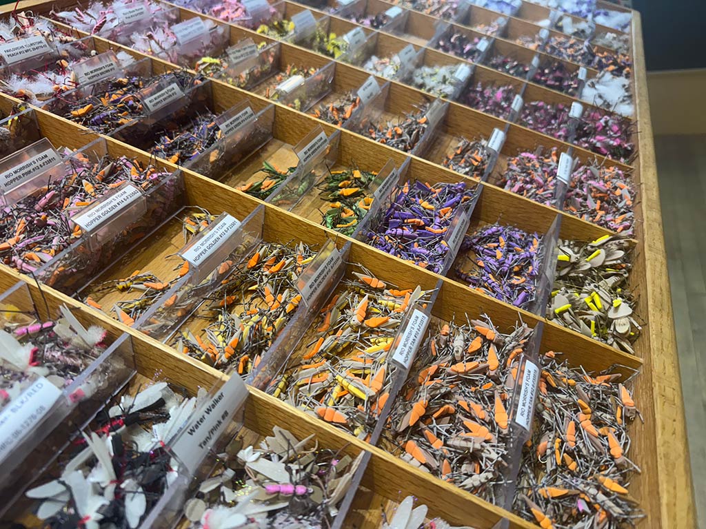 A view of a selection of different flies for fly fishing in a shop in Wyoming.