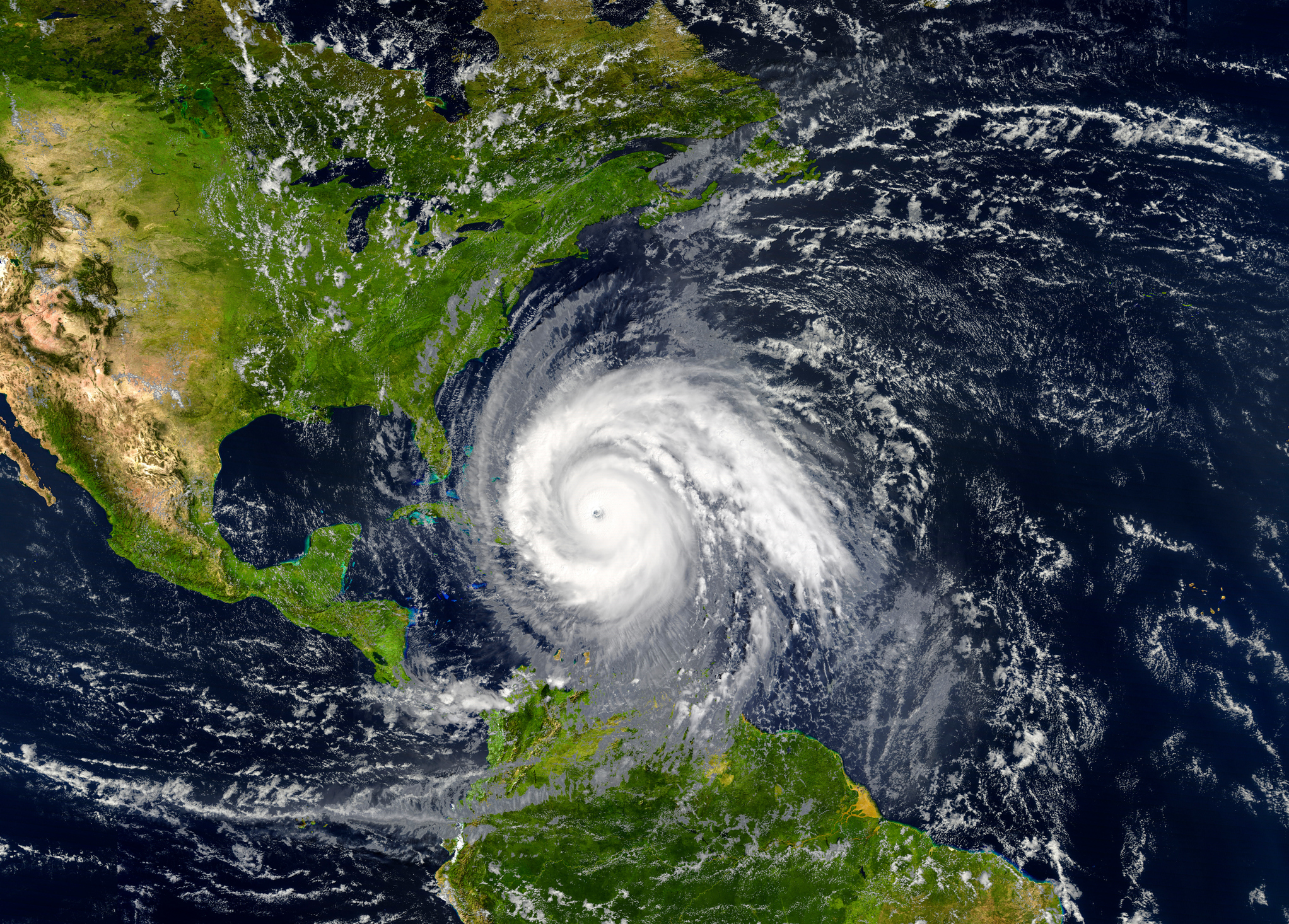 Satellite image shows a large hurricane with a clear eye over the Atlantic, getting close to the southeastern U.S., and it's highlighting possible Florida hurricane recovery needs.